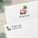 Santa Beach Christmas Return Address Card Envelope<br><div class="desc">Bring a bit of surf and sand to your holiday mail with this playful tropical Christmas envelope. On the front, the top left corner features a relaxed Santa Claus in sunglasses lounging in a pink flamingo floaty out on the ocean, with a small island and a palm tree decorated with...</div>