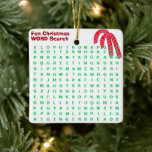 Santa Christmas Mini 15 Word Puzzle Candy Canes Ceramic Ornament<br><div class="desc">Fun keepsake for children of all ages to hang on their Christmas tree year-after-year. Front has Fun Mini 15 Word Search Fun Puzzle with text in green against white background, with red white candy canes. Backside has 15 words written in sky blue, with = Merry Christmas written in red script....</div>
