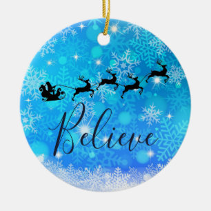 Santa Claus and his Flying Reindeer - Believe Ceramic Ornament