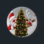 Santa claus and reindeer behind a christmas tree.j 6 cm round badge<br><div class="desc">christmas santa claus reindeer, 
frozen friends colourful funny , 
vintage magic snowflake art, 
2020 happy new year, 
joy gift snow flying, 
year new celebration deer, 
happy xmas winter holiday, 
bell merry cartoon illustration, 
fun animal party cute, 
reindeer christmas santa claus , </div>