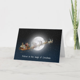 Santa Claus and reindeer in moonlight Holiday Card