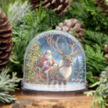 Santa Claus and Reindeer Vintage Christmas  Snowglobe<br><div class="desc">This snowglobe features a digital watercolor image of Santa Claus in his sleigh and a reindeer. The vintage like image is perfect for a keepsake snow globe as it reminds everyone of the "classic Santa" . Buy the snow globe for yourself or buy ita sa gift for that special someone....</div>