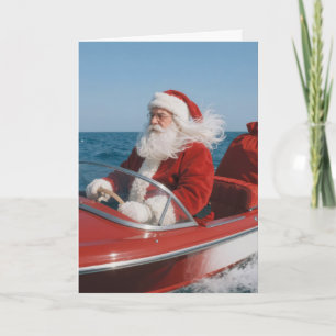 Santa Claus Delivering Gifts By Speedboat Card