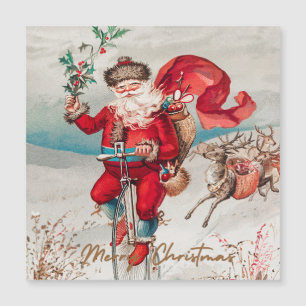 Santa Claus on a penny farthing with reindeer