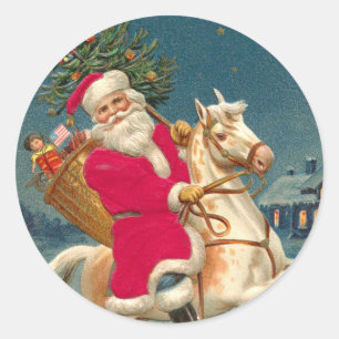 Santa Claus on a wooden horse Classic Round Sticker
