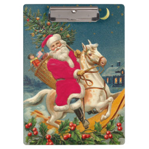 Santa Claus on a wooden horse Clipboard