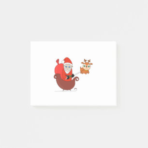 Santa Claus on the Sleigh with a Cute Reindeer Post-it Notes