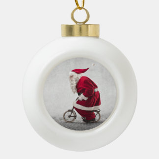 Santa Claus Rides A Bicycle Ceramic Ball Christmas Ornament