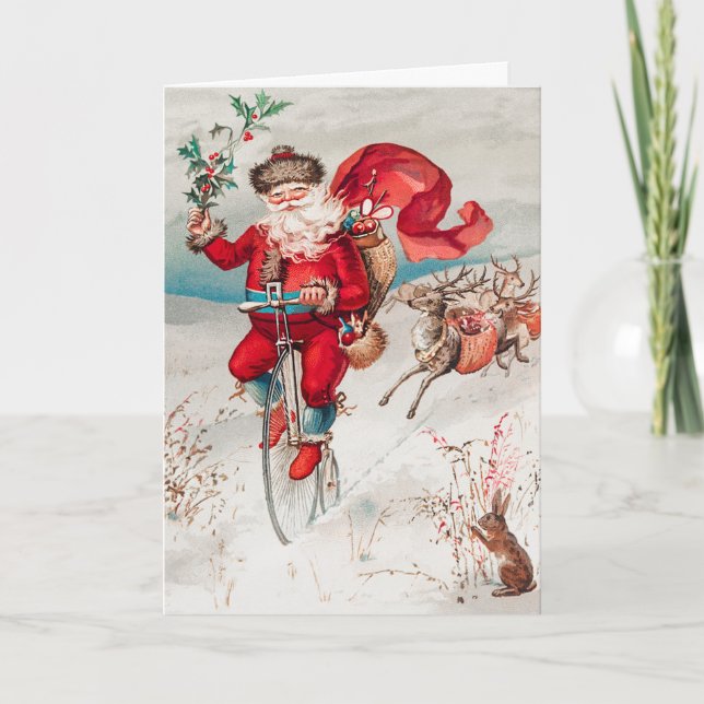 Santa Claus Riding Bicycle, Reindeer and Rabbit Holiday Card (Front)