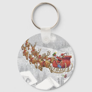 Santa Claus riding on sleigh with gift box Key Ring
