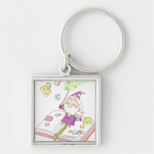 Santa Claus sitting on book Key Ring