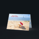 Santa Claus starfish in beach sand Holiday Card<br><div class="desc">Starfish in beach sand wearing a Santa Claus hat with seagulls.
Text can be changed.</div>
