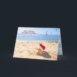 Santa Claus starfish in beach sand Holiday Card<br><div class="desc">Starfish in beach sand wearing a Santa Claus hat with seagulls.
Text can be changed.</div>