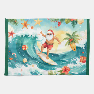 Santa Claus surfing on Christmas Holiday Tea Towel