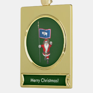 Santa Claus With Ensign Of Wyoming Gold Plated Banner Ornament