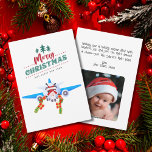 Santa crashes into Aeroplane, Photo,Funny Christma Holiday Card<br><div class="desc">Santa crashes into Aeroplane, Photo, Funny Merry Christmas Holiday Card. Design features an illustration of a big aeroplane with Santa crashing into it and holding onto to the presents as to not lose them. The greeting 'Merry Christmas and Happy New Year sits above them. The back of card has a...</div>