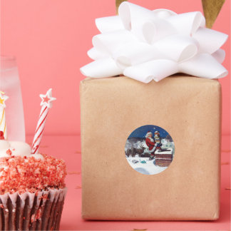 Santa delivering armload of books by Wyeth Classic Round Sticker