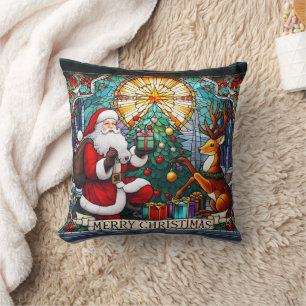 Santa gifts joy to a reindeer by a Christmas tree Cushion