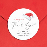 Santa Hat Baby Shower Thank You Classic Round Sticker<br><div class="desc">Cute sticker for your Christmas holiday season baby shower party favours and thank you cards featuring "A Merry Little Thank You" in a chic script with a heart swash and a watercolor illustration of a red Santa Claus hat. Personalise with the mother's name and shower date in simple typography.</div>