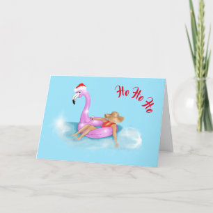 Santa hat on a pink flamingo float holiday card