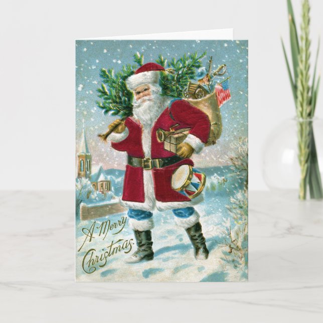Santa in the Snow Carrying Drum and Tree Holiday Card (Front)