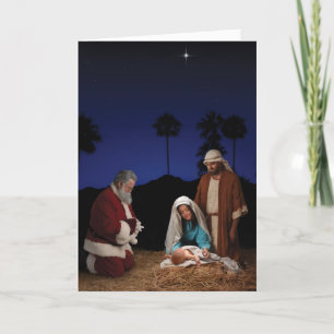 Santa Kneeling at Nativity Holiday Card