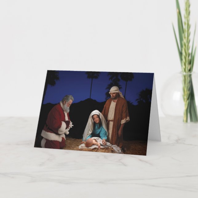 Santa Kneeling at Nativity Holiday Card (Front)