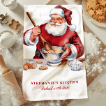 Santa Mixing Cookies Personalised Christmas Tea Towel<br><div class="desc">Get into the holiday spirit with this personalised Christmas kitchen towel featuring Santa mixing up a batch of cookies. This festive design adds a nostalgic touch to your kitchen decor, making it perfect for the holiday season. Customise it with your name or a special message for a unique kitchen accessory...</div>