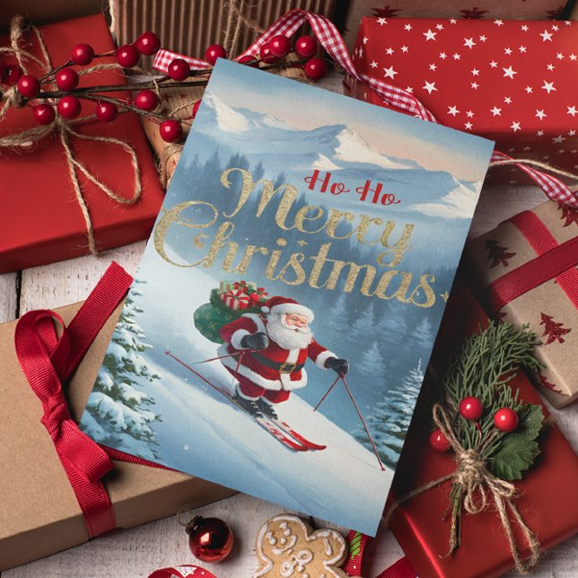 Santa rides skis down a snow-covered slope postcard (Creator Uploaded)