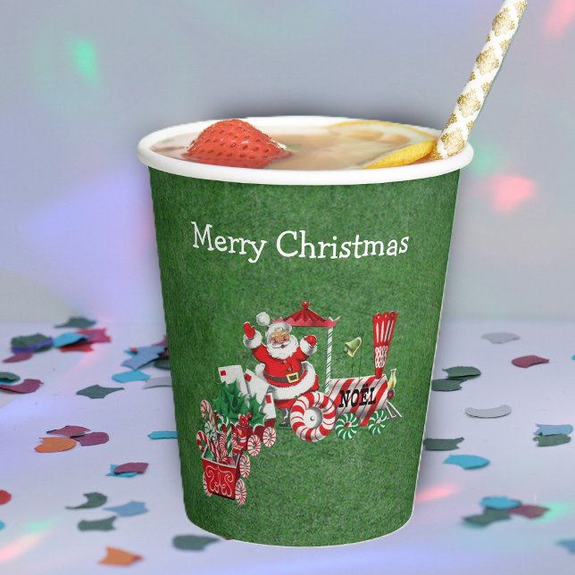 Santa Riding Christmas Train Candy Canes Letters Paper Cups (Santa riding Christmas train candy canes, letters on green paper party cups.)