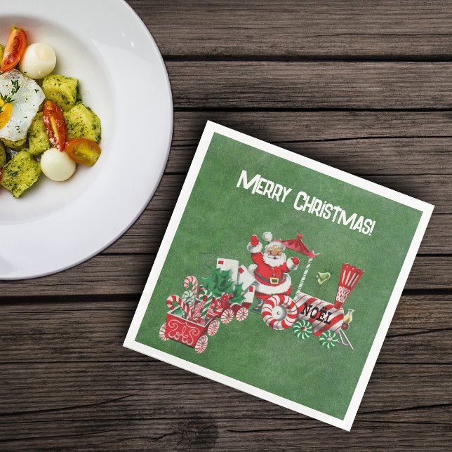 Santa Riding Red White Christmas Train Dark Green Napkin (Santa riding red white train with candy canes and letters on Merry christmas green paper napkins.)
