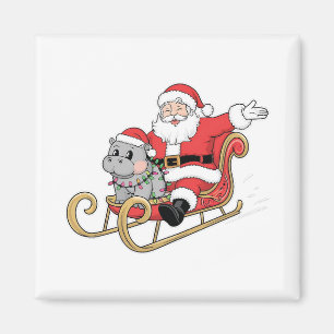Santa Riding Sleigh with a Moo Deng Baby Hippo Magnet