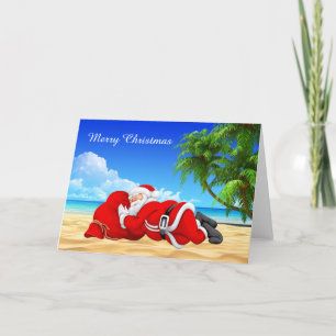 santa sleeping on the beach holiday card