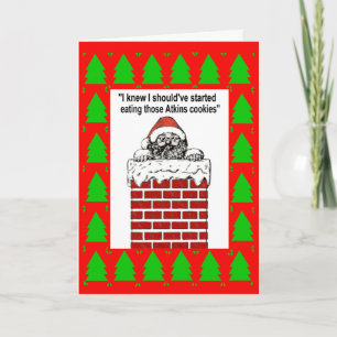 Santa Stuck In A Chimney Greetings Card