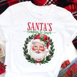 Santa's Coming to Town Classic Christmas<br><div class="desc">Get ready for the most wonderful time of the year with this classic "Santa's Coming to Town" tee! Featuring a jolly Santa Claus surrounded by a festive wreath, this shirt is perfect for spreading holiday cheer. The traditional design and warm colours evoke the nostalgia and excitement of Christmas, making it...</div>