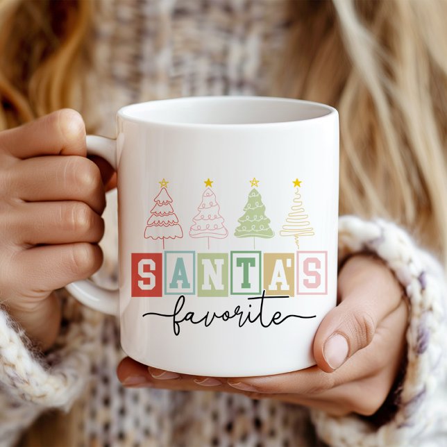 "Santa's Favourite" Modern Pastel Christmas Trees Coffee Mug ("Santa's Favorite" Modern Pastel Christmas Trees Coffee Mug in a girl's hands.)