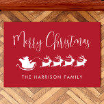 Santas Sleigh Merry Christmas Red Doormat<br><div class="desc">Festive seasonal red doormat for your Christmas holiday decor that features reindeers flying Santa's sleigh through air,  "Merry Christmas" in a modern white script and your name in simple white typography.</div>