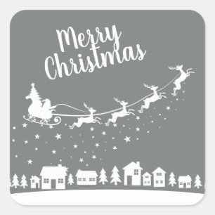 Santa's sleigh & reindeer flying above the houses square sticker