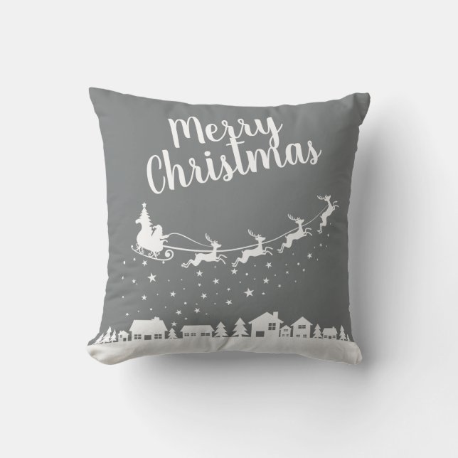 Santa's sleigh & reindeers flying above the city cushion (Front)