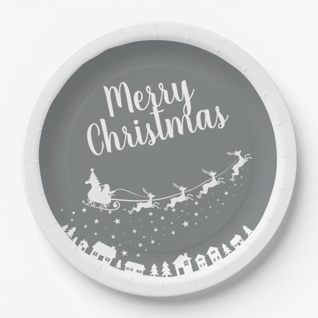 Santa's sleigh silhouette flying above the houses paper plate (Front)
