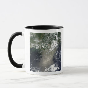 Satellite view of streaks and ribbons of oil mug