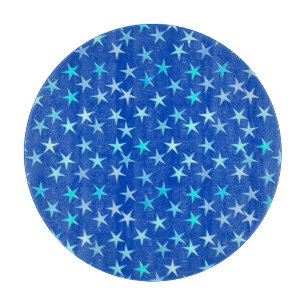 Satin stars, pale blue on cobalt cutting board