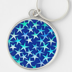 Satin stars, pale blue on cobalt key ring
