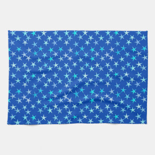Satin stars, pale blue on cobalt tea towel