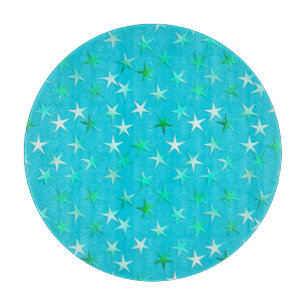 Satin stars, pale green and blue on turquoise cutting board