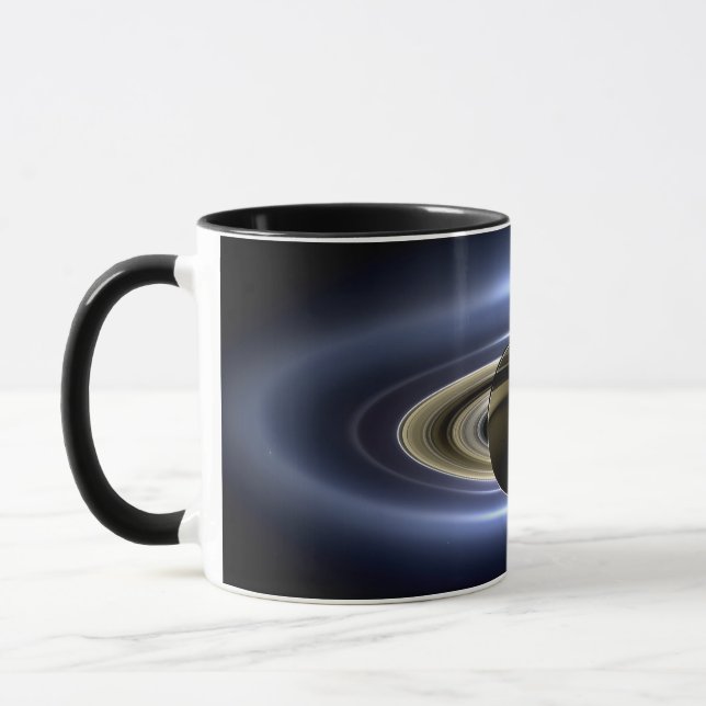 Saturn.  The Day Earth Smiled Mug (Left)