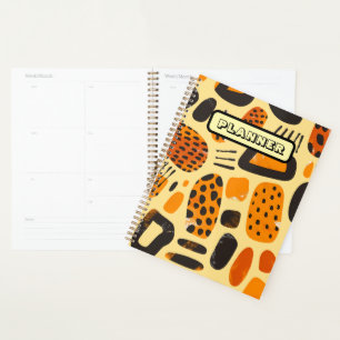 "Savanna Pop: Tribal Vibes in Orange & Black" Planner