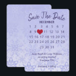 Save the Date Wedding Calendar Purple Snowflakes Invitation<br><div class="desc">"Save the Date" calendar with red heart on pastel purple snowflake pattern for upcoming wedding.
Text is editable.
The month can be edited.
Place the red heart on the date of your wedding.
Background can be changed.</div>