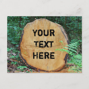 Sawn log in a forest customisable postcard