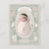 Scalloped frame with leafy surround & baby things